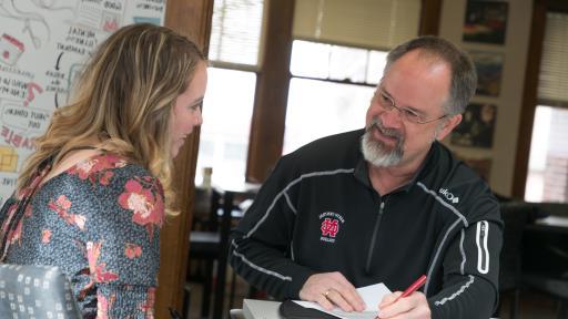 professor and student talking